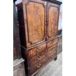 A George III mahogany linen press converted to a hanging wardrobe, length 128cm, depth 60cm,