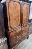 A George III mahogany linen press converted to a hanging wardrobe, length 128cm, depth 60cm,