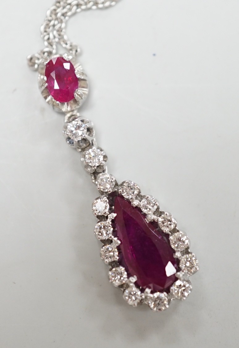 A modern 750 white metal, two stone ruby and fifteen stone diamond set pear shaped drop pendant - Image 2 of 2