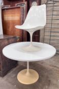 A small mid century white melamine topped ‘Tulip’ design table, 101cm, and a single matching