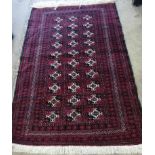 A Bokhara burgundy ground rug, 164 x 110cm *Please note the sale commences at 9am.