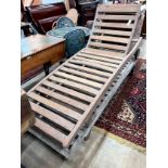Two weathered teak garden loungers, length 199cm width 69cm *Please note the sale commences at 9am.