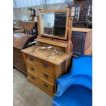 An Arts & Crafts oak dressing chest, width 99cm, depth 53cm, height 164cm *Please note the sale