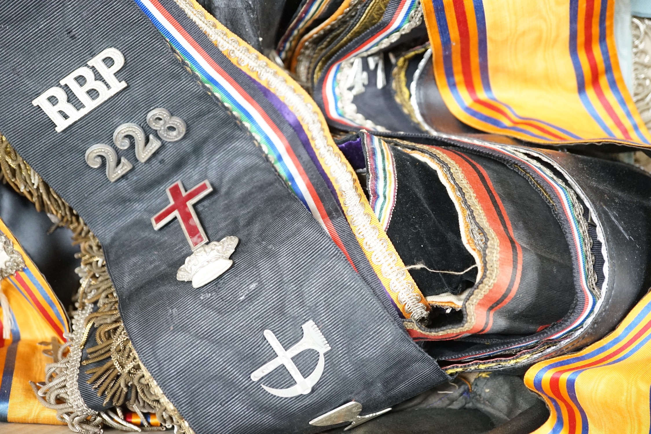 An Orange Order sash, seven Masonic sashes and two aprons