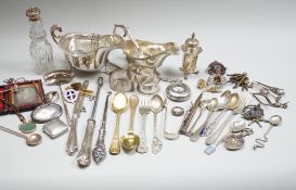 Sundry small silver including two sauceboats, napkin rings, mounted glass condiment bottle,