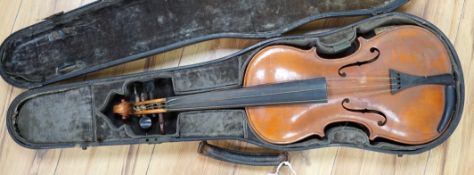 An early 20th century Stainer violin, patent number 23140, back measures 36.5cm excl button. cased