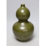 A Chinese olive green double gourd vase, 29cm high