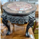 A Chinese carved hardwood rouge marble-topped jardiniere stand, diameter 43cm, height 46cm *Please