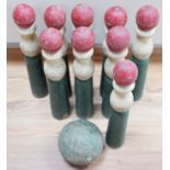 A set of turned wooden skittles and ball