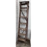 A vintage pine six tread step ladder, height 183cm *Please note the sale commences at 9am.