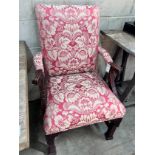 A reproduction mahogany upholstered Gainsborough style library chair, width 65cm, depth 70cm, height