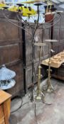 A wrought iron candelabrum lamp standard, height 187cm *Please note the sale commences at 9am.