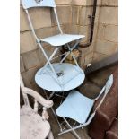 A blue painted wrought iron folding cafe table and pair of matching chairs, diameter 60cm, height