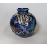 A Chiswell Jones art pottery lustre vase, decorated with three fish, No 8596, 21cm