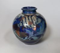 A Chiswell Jones art pottery lustre vase, decorated with three fish, No 8596, 21cm