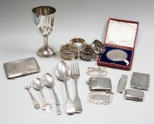 Sundry small silver including a George V goblet, cigarette case, vesta cases, flatware, wine