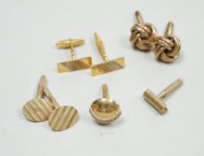 A modern three colour 750 pair of cufflinks, 9.2 grams, a pair of 9ct gold oval cufflinks one