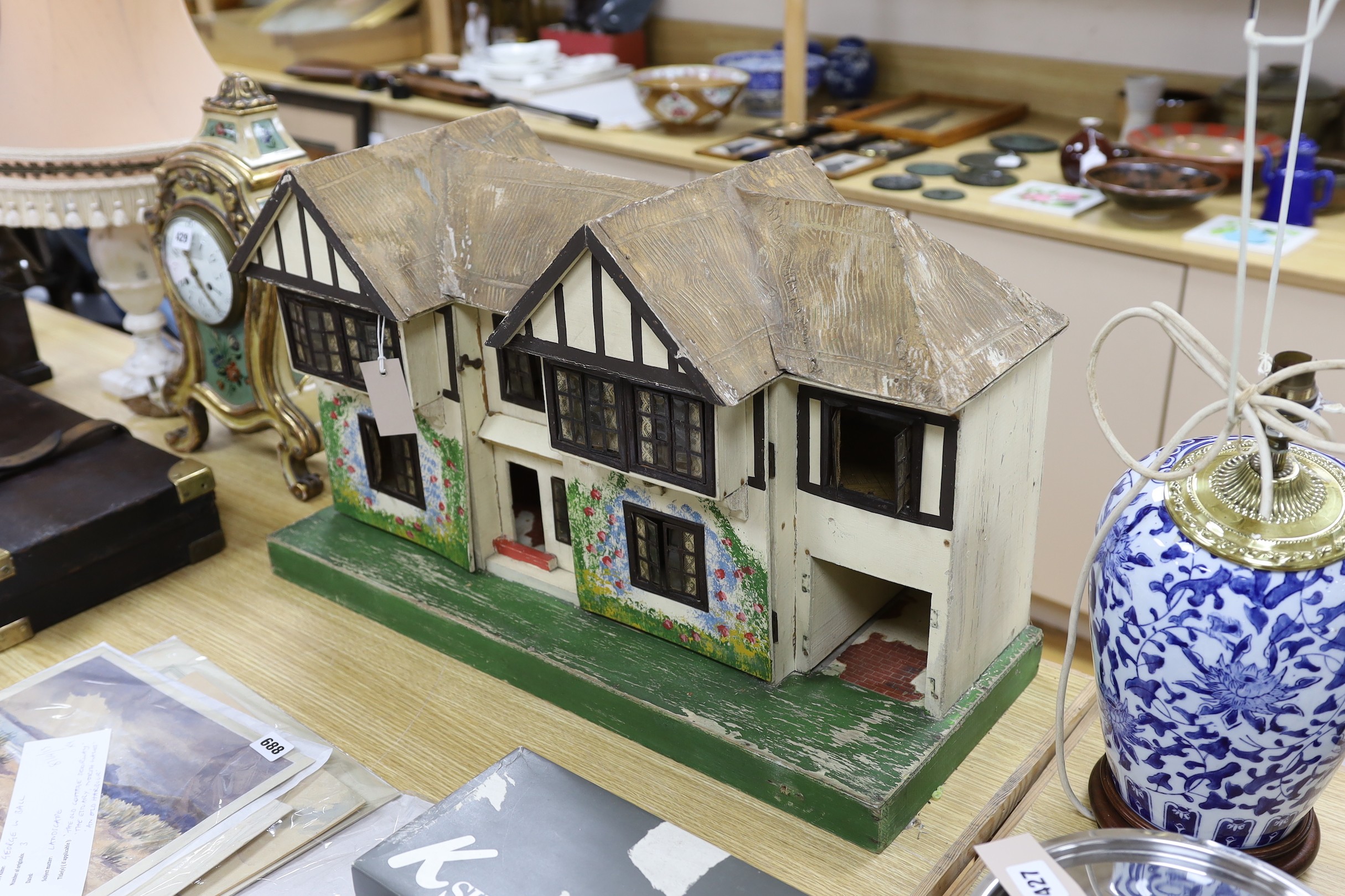 A Tri-Ang mock Tudor style doll's house and furnishings, 68cms wide, 42cms high - Image 2 of 2