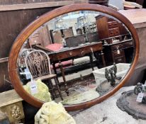 An Edwardian strung mahogany wall mirror, width 90cm, height 65cm *Please note the sale commences at