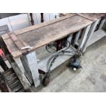 A pair of stained oak console tables with iron bound raw wood tops, width 132cm, depth 40cm,
