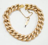 An early 20th century 15ct curb link bracelet, with later 9ct gold charm, 17cm, gross weight 26.5