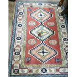 A Caucasian style rug, 174 x 117cm *Please note the sale commences at 9am.