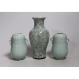 A Chinese celadon crackle ware vase and a pair of smaller celadon vases, largest 16.cms