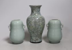 A Chinese celadon crackle ware vase and a pair of smaller celadon vases, largest 16.cms