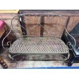 A wrought iron garden bench, width 120cm *Please note the sale commences at 9am.