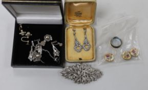 A small group of white metal and paste set jewellery, including a double clip brooch, necklace and