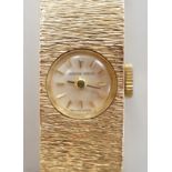 A lady's 9ct gold Buech Girod manual wind bracelet watch, 16.3cm, gross weight 25.3 grams,