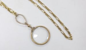 A yellow metal mounted eye glass, 85mm, suspended from a chain marked 375, 29.3 grams, 84cm.