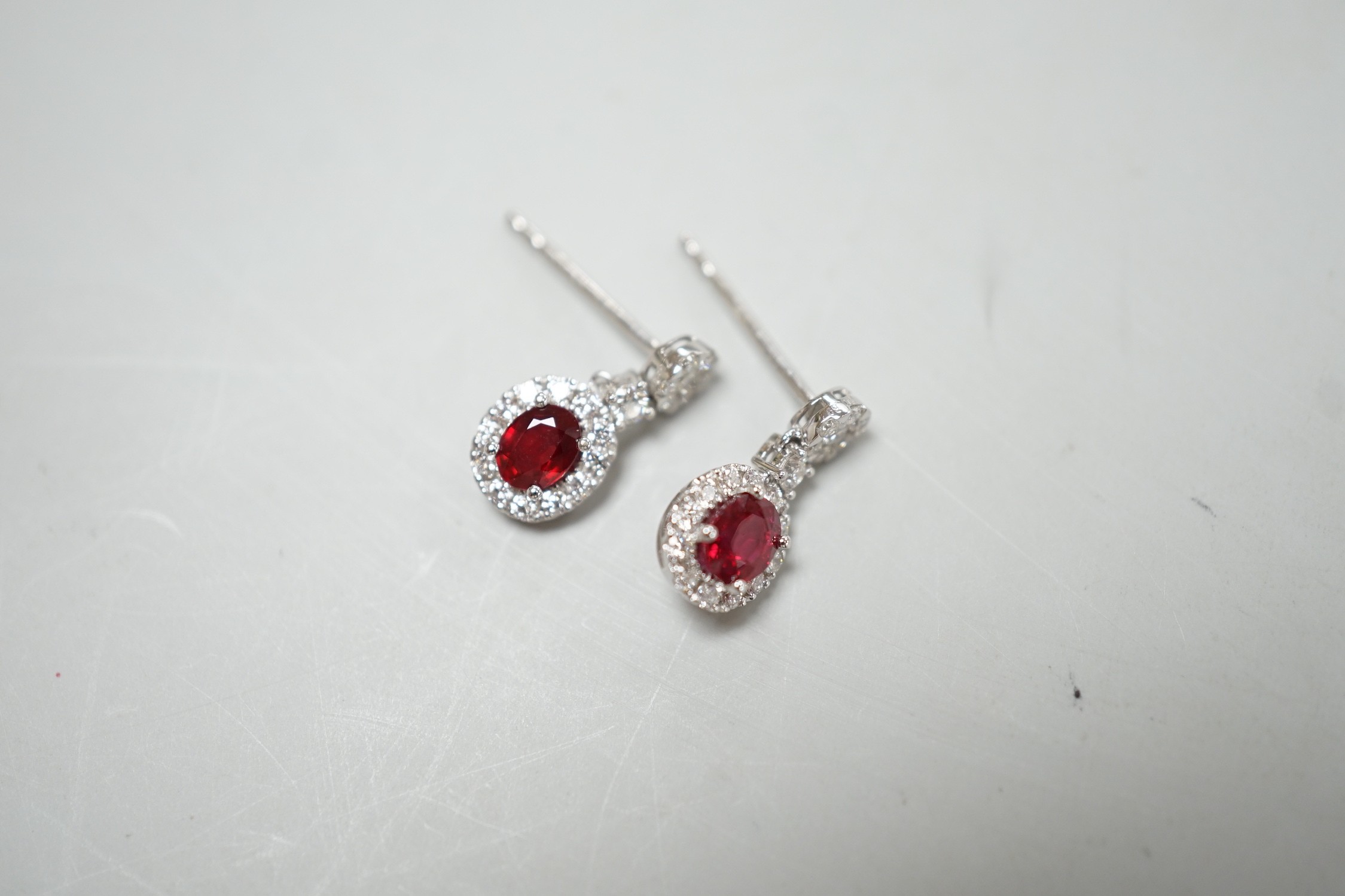 A modern pair of 750 white metal, ruby and diamond cluster set drop earrings, 13mm, gross weight 2.3 - Image 2 of 2
