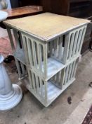 A painted revolving bookcase, width 47cm, height 73cm *Please note the sale commences at 9am.