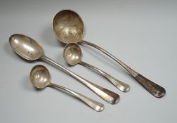 A late Victorian silver rat tail pattern soup ladle, basting spoon and a pair of ladles, by Josiah