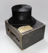 A boxed gentleman's black top hat, by Royal appointment: Woodrow, 45 Gordon St. Glasgow