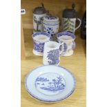 A pair of German 17th century faience pewter mounted steins, together with a selection of blue and