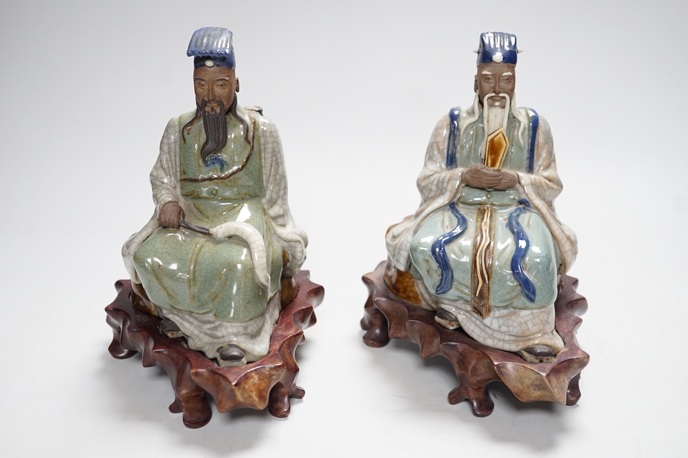 Two Shiwan stoneware figures of the Jade Emperor and Lu Dongbin, losses, 19cm