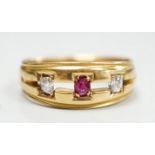 A late Victorian 18ct gold, ruby and diamond set three stone ring, size K/L, gross weight 4 grams.