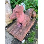 A terracotta recumbent greyhound garden ornament, height 40cm *Please note the sale commences at