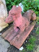 A terracotta recumbent greyhound garden ornament, height 40cm *Please note the sale commences at