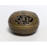 A Chinese circular carved bronze censer, 13.5cm diameter