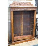 A late Victorian carved oak open bookcase, width 106cm *Please note the sale commences at 9am.