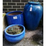 Three blue glazed earthenware garden planters, largest height 62cm *Please note the sale commences