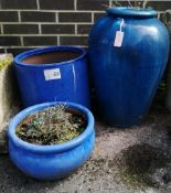 Three blue glazed earthenware garden planters, largest height 62cm *Please note the sale commences