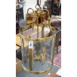 A four light brass hall lantern, 62cm tall