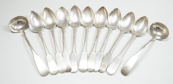 A set of nine early 19th century Scottish provincial silver fiddle pattern dessert spoons, 18.5cm