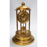 An early 20th century gilt brass pedestal mantel clock, 36cm