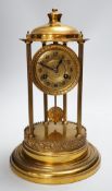 An early 20th century gilt brass pedestal mantel clock, 36cm