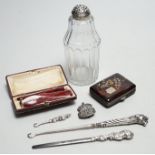 A Georgian silver mounted sugar sifter, a tortoiseshell and plique case, four silver items and two
